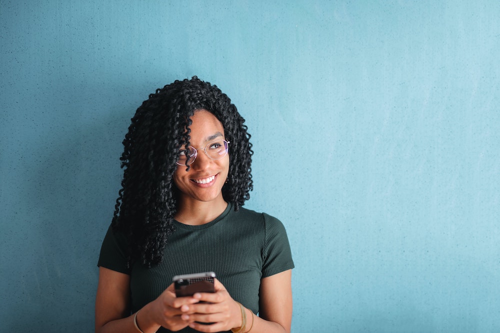 Person with Smartphone using Camflare